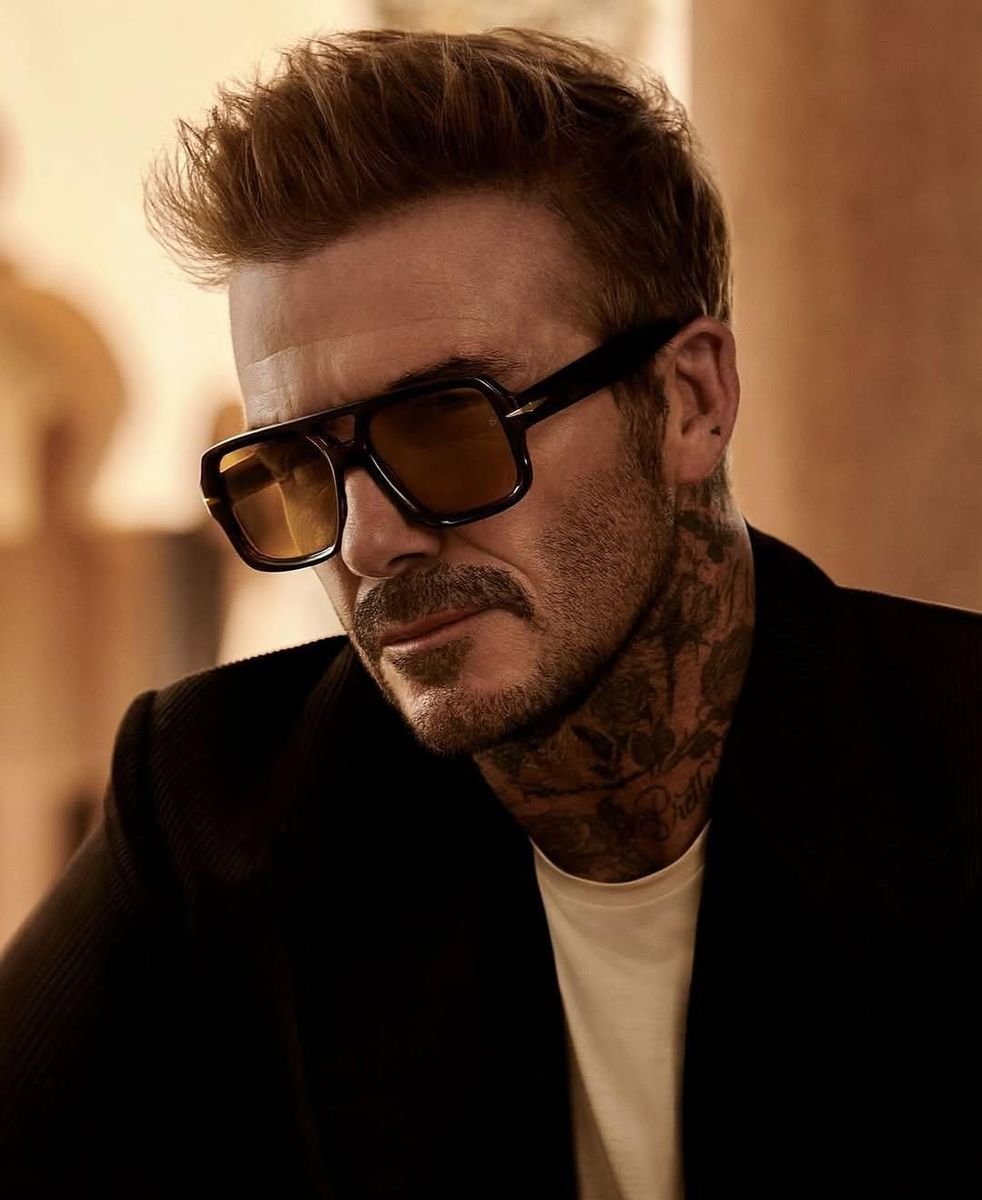 David Beckham wearing tinted sunglasses in an eyewear campaign image