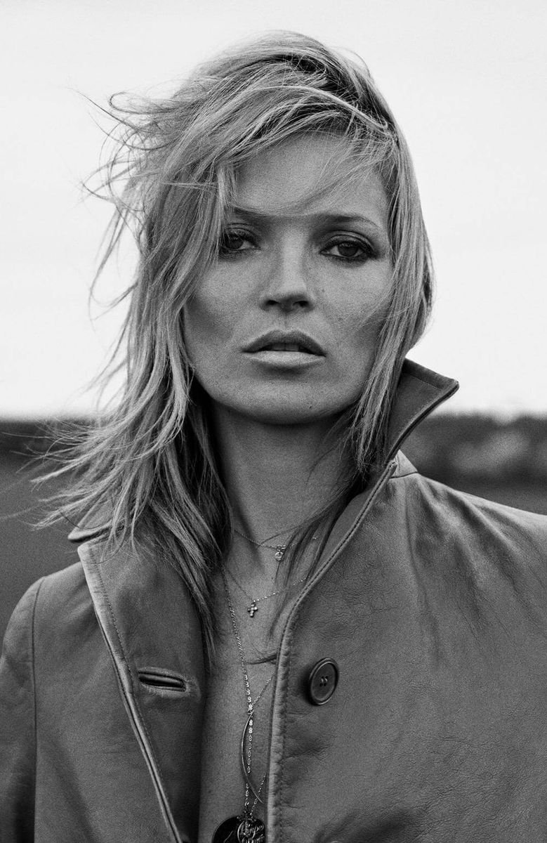 Black and white portrait of Kate Moss with windswept hair
