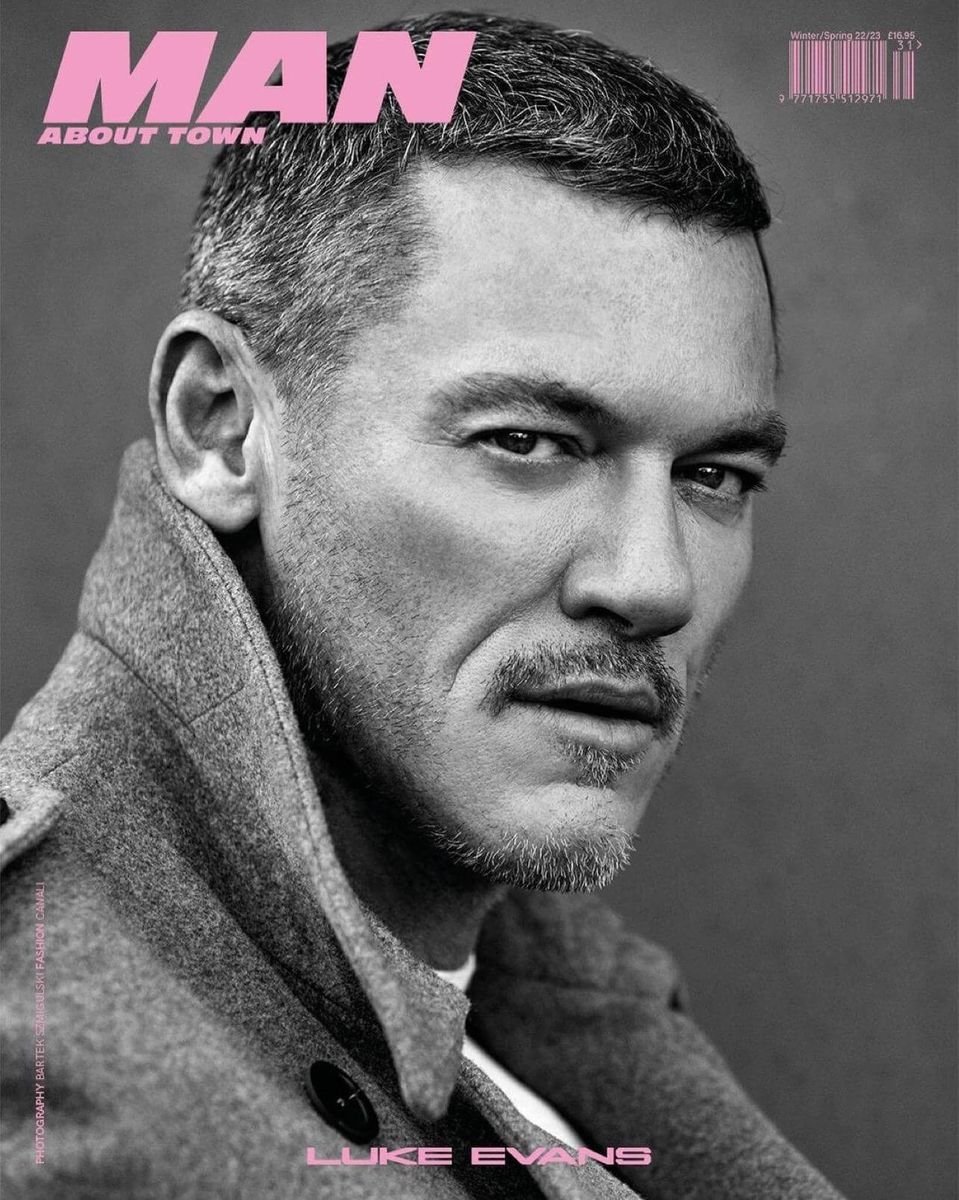 Black and white close-up of Luke Evans on the cover of Man About Town