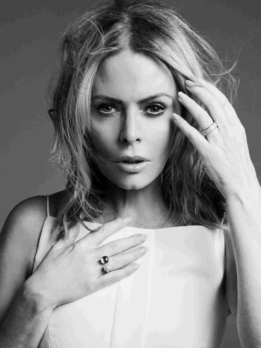 Black and white portrait of Patsy Kensit with her hand in her hair